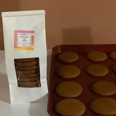Molasses tea cakes beside a packaged bag