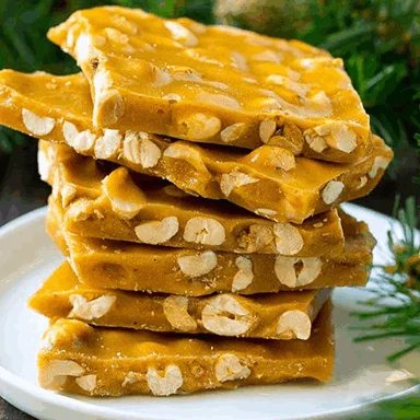Stack of golden peanut brittle